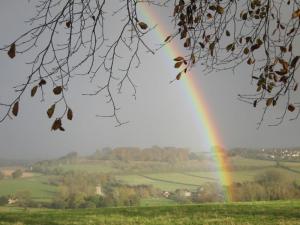 Rainbow over Old Sarum, Salisbury, Wiltshire UK -- by Ana Gobledale, UK